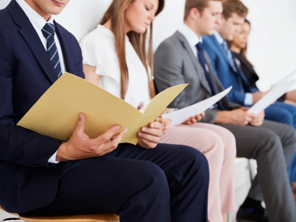 A line of applicants for a job interview.